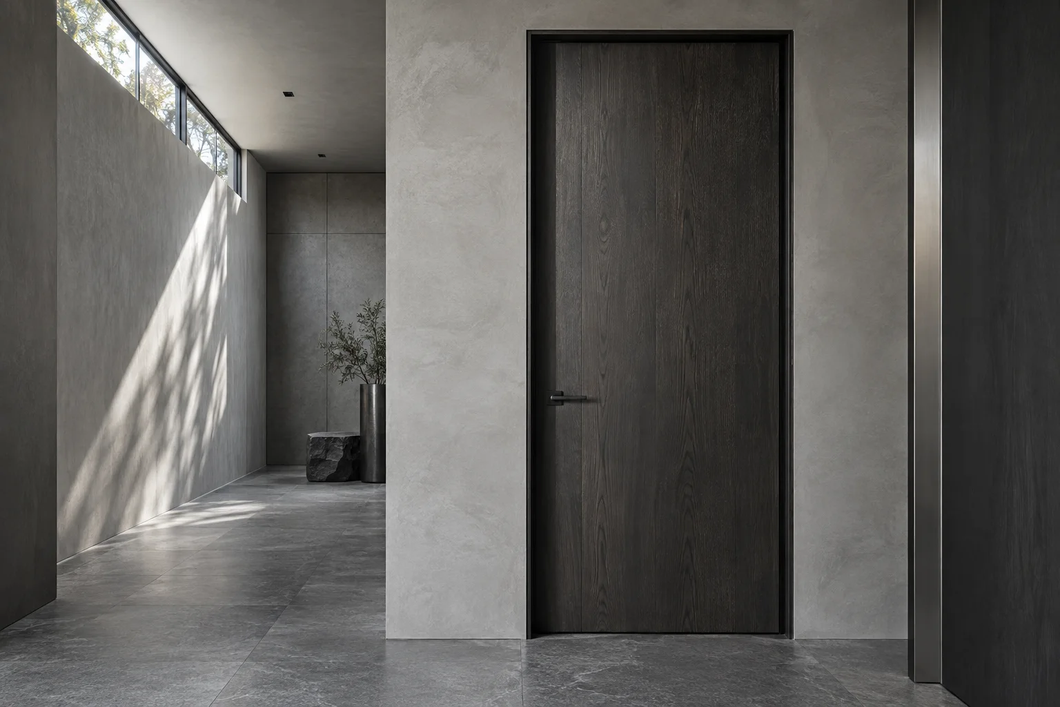 Charcoal timber door in a cool grey architectural corridor — design concept