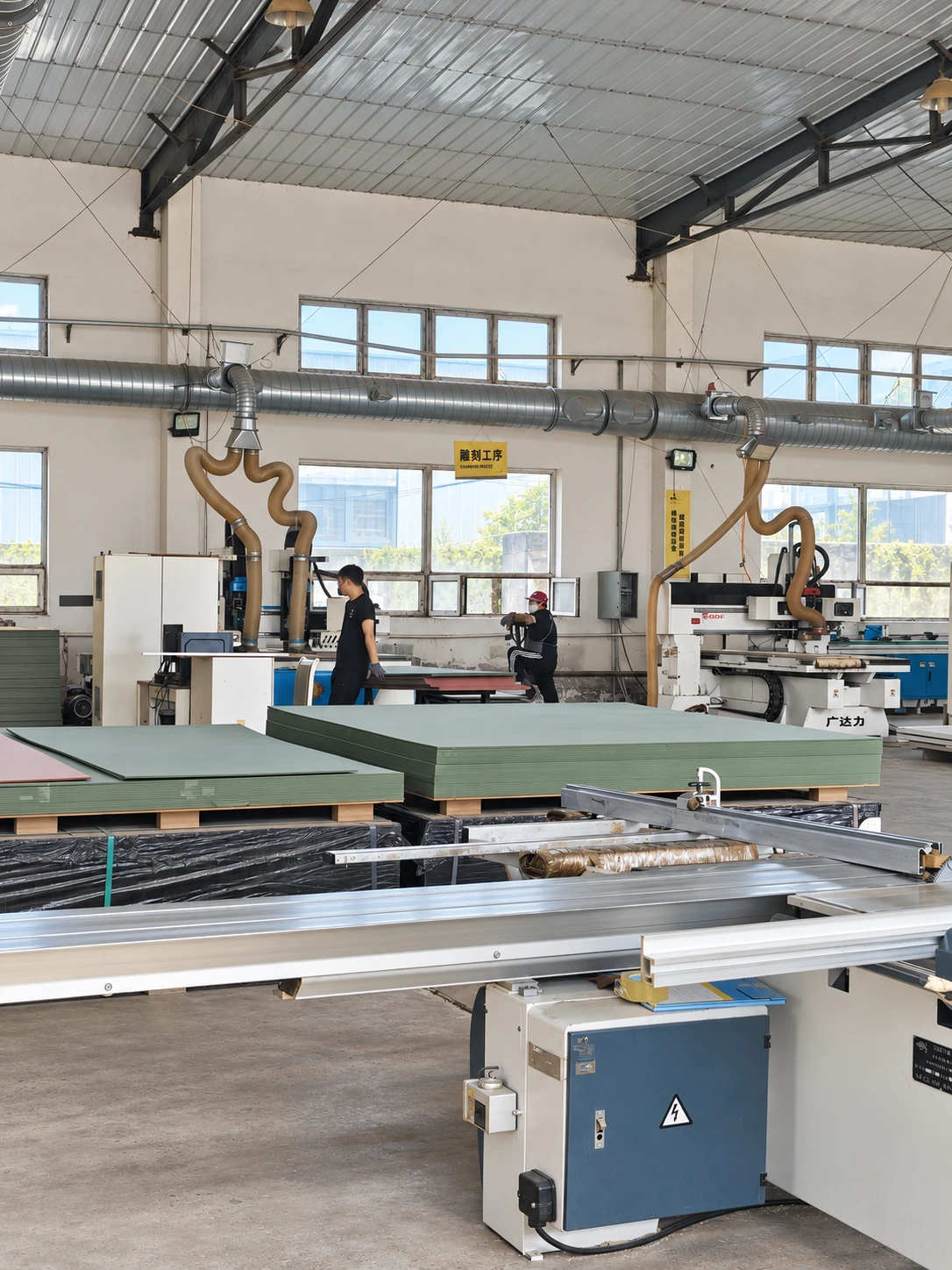 SNEJ custom cabinetry and wood door manufacturing workshop in Xinmin, Shenyang, China
