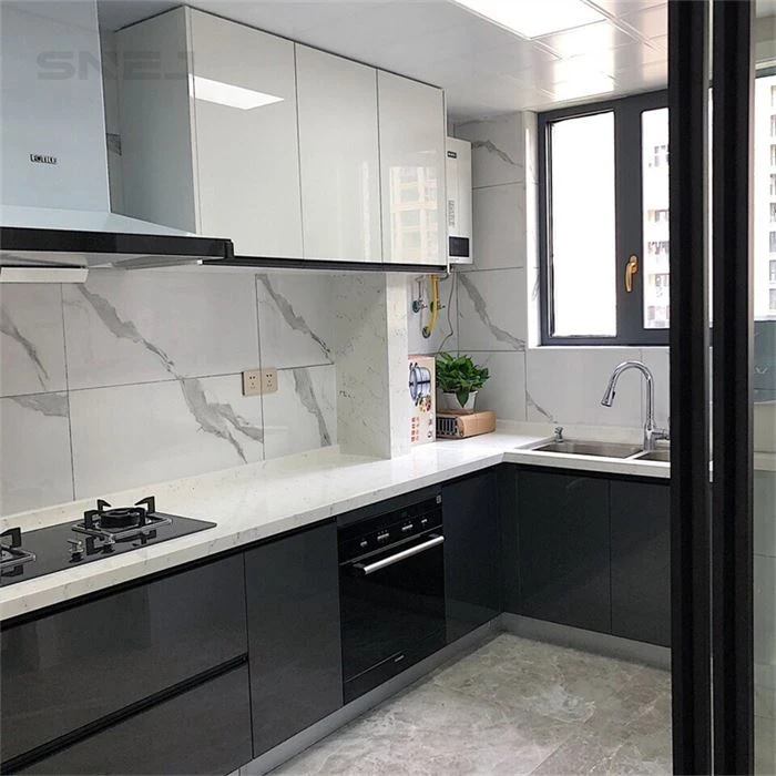 Two-tone kitchen cabinets with a marble-pattern splashback - Custom Fit Cabinets by SNEJ