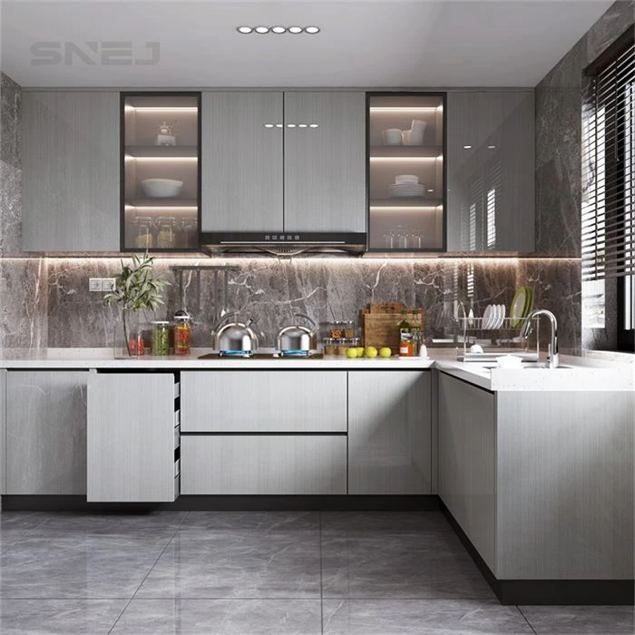 Grey L-shaped kitchen cabinets with glass-front wall storage - Custom Built In Kitchen Cabinets by SNEJ