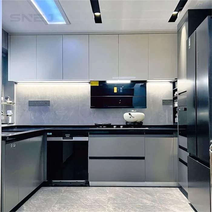 Grey kitchen cabinets with black worktops and tall appliance storage - Custom Tall Cabinets by SNEJ