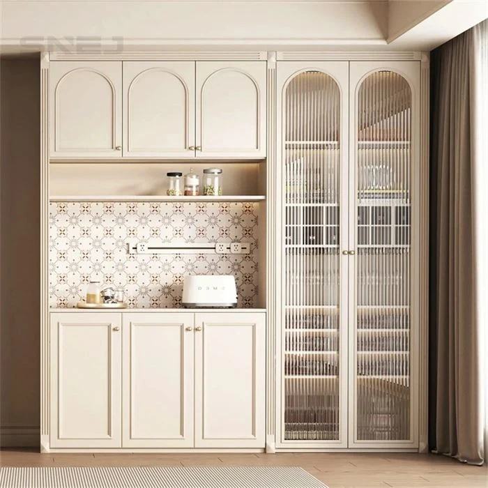 Cream arched-panel cabinets with a tall glass display cupboard - New Custom Cabinets by SNEJ