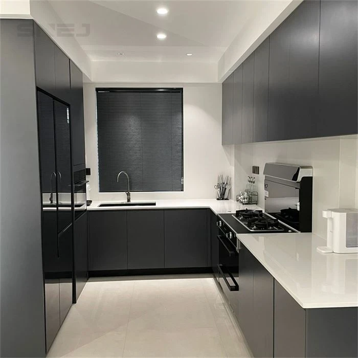 Dark grey kitchen cabinets with a white worktop - New Custom Kitchen Cabinets by SNEJ