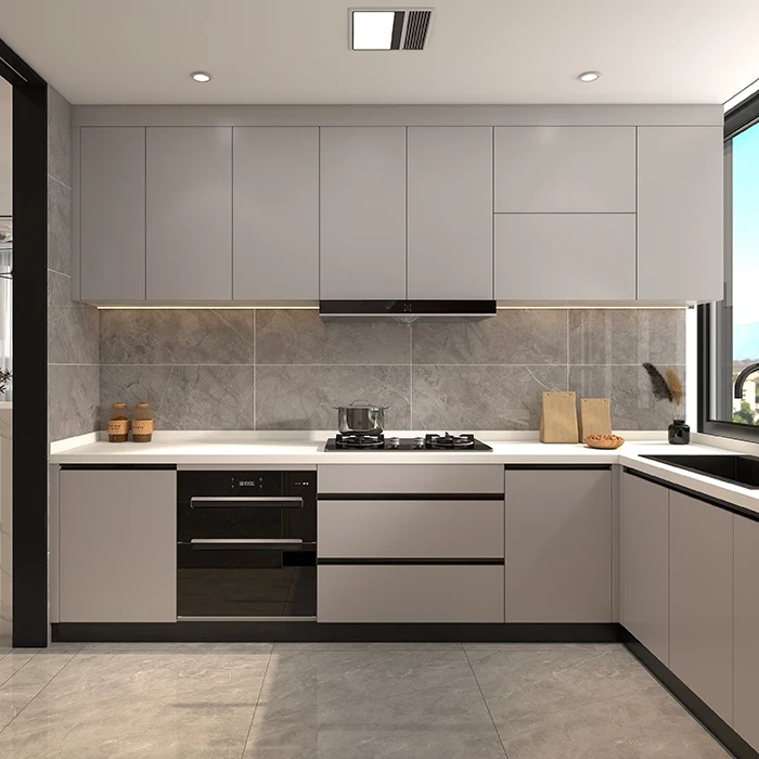 Grey L-shaped kitchen cabinets with dark recessed handles - L Shaped Kitchen Cabinets by SNEJ