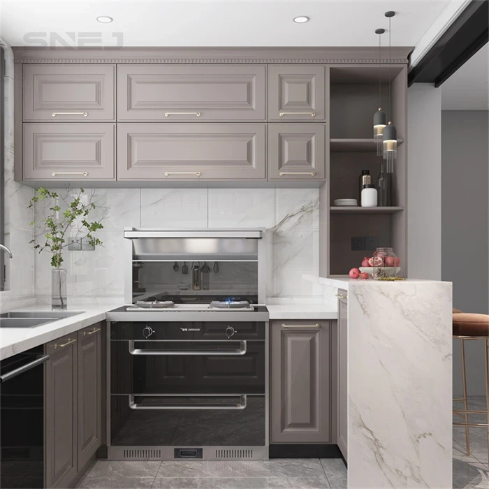 Grey framed kitchen cabinets beside a pale peninsula - Modern Prefab Kitchen Cabinets by SNEJ