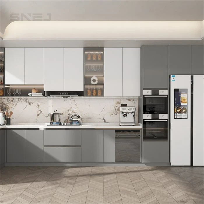 Two-tone kitchen cabinets with a tall white refrigerator - Fine Cabinets by SNEJ