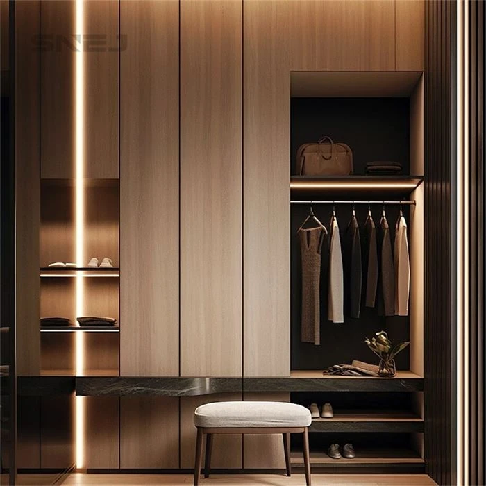 Wood-tone wardrobe with open hanging space beside a dressing table - Open Closet With Shelves by SNEJ