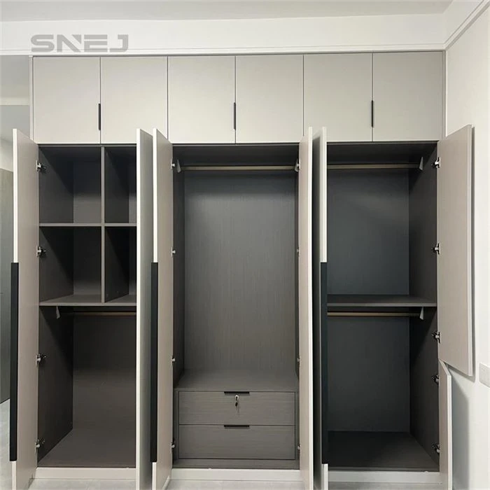 Wardrobe with doors open to reveal rails, shelves and drawers - Open Clothes Closet by SNEJ