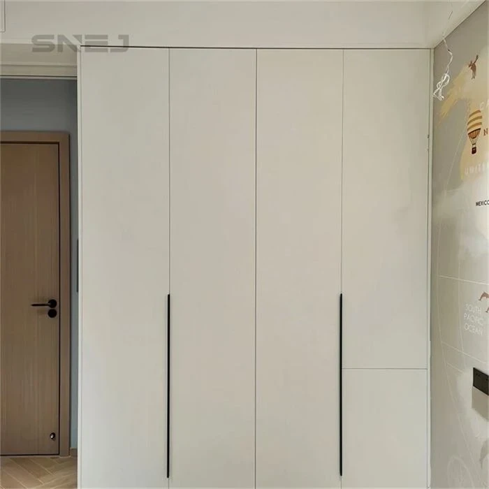 Full-height fitted wardrobe with aligned doors and slim handles - Updating Closet Doors by SNEJ, image 2