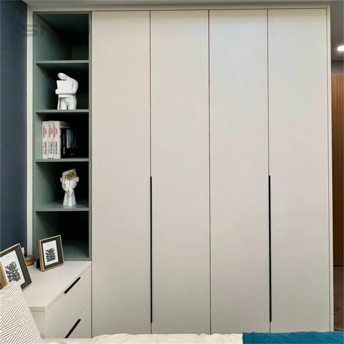 Pale wardrobe doors beside green open shelves - Open Room Closet by SNEJ