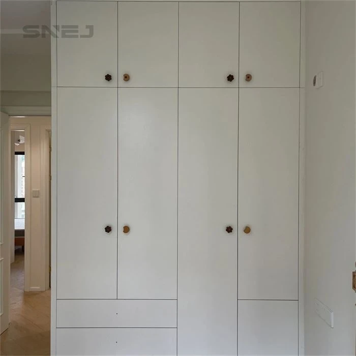 White fitted wardrobe with upper cupboards and round handles - Updating Closet Doors by SNEJ