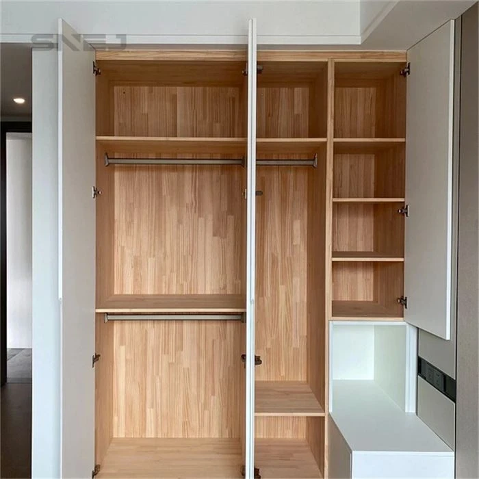 Open wardrobe interior showing hanging rails, shelves and lower storage - Closets With Doors And Shelves by SNEJ, image 3