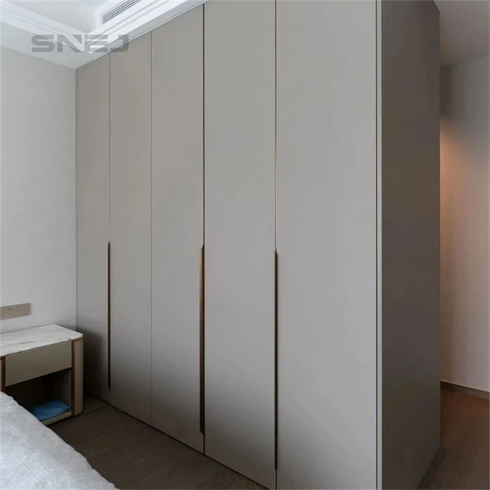 Full-height fitted wardrobe with aligned doors and slim handles - Plywood Open Wardrobe by SNEJ, image 2