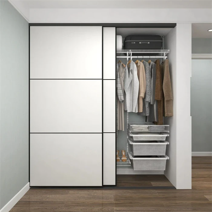 Wardrobe with sliding panels revealing hanging storage and baskets - Standard Sliding Wardrobe Doors by SNEJ